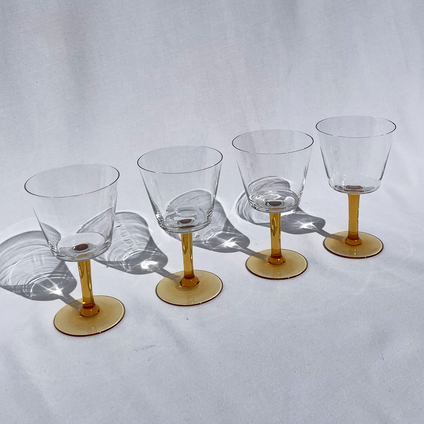 Vintage golden-stem wine glasses